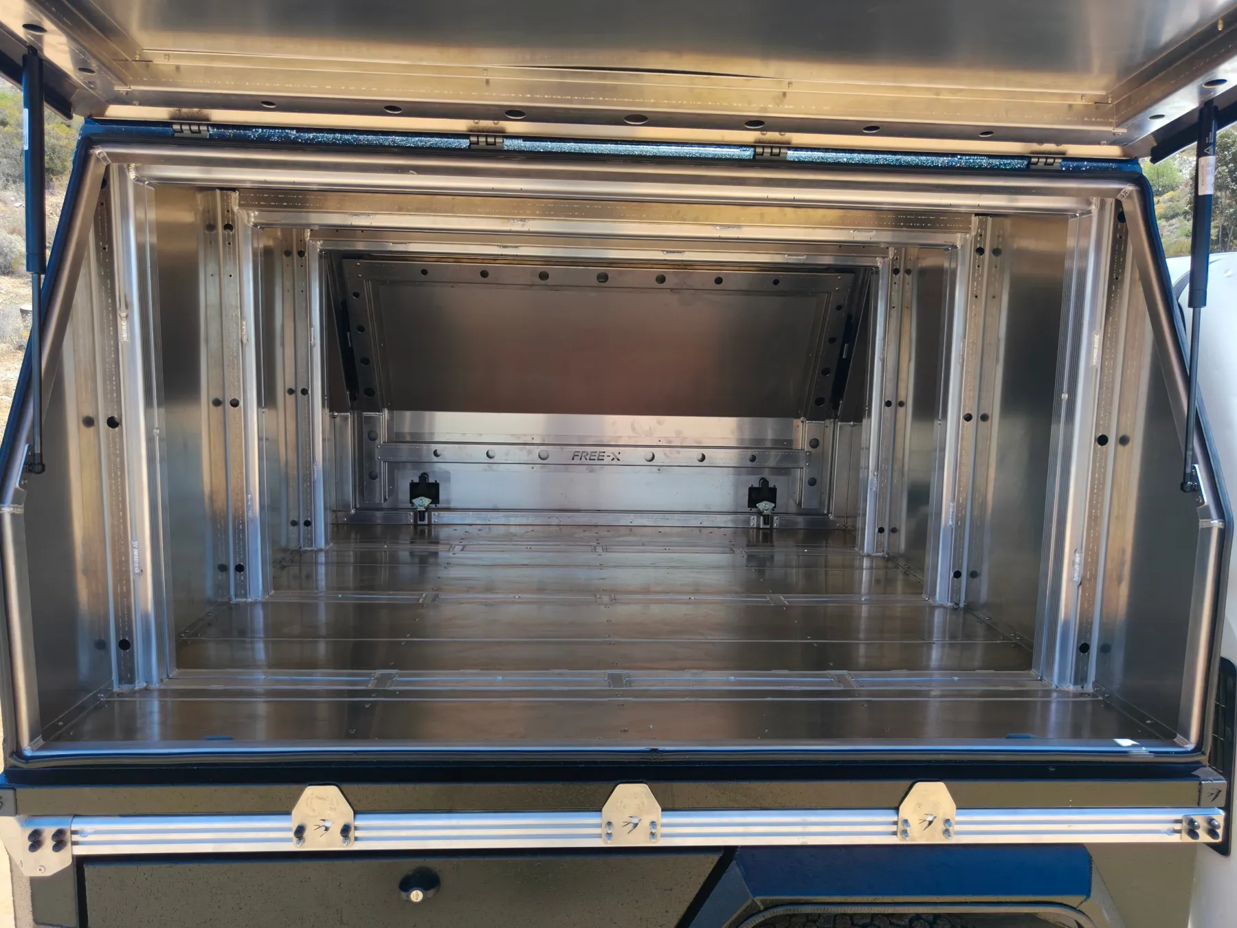 Inside a Free-X canopy: aluminium extrusion frame and floor