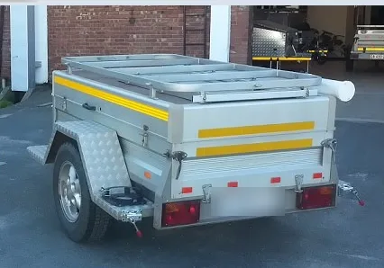 The rear of an earlier Alu-Star camping trailer