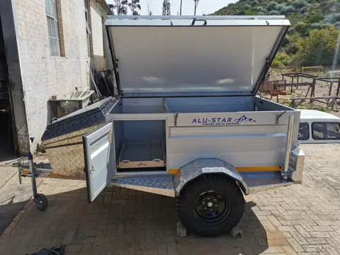Tracker with the lid and front door open