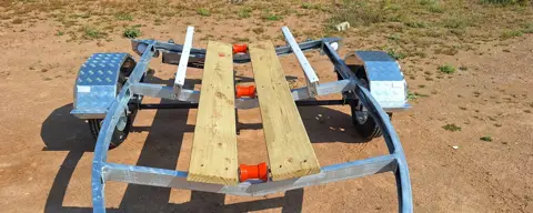 Boat trailers: Timber bunks, keel rollers and side guides
