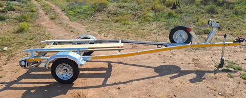 Boat trailers: Falcon 520 trailer: galvanised frame, chequer-plate mudguards, spare wheel on the drawbar