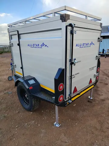 Cargo: Rear swing door, with the park stands down