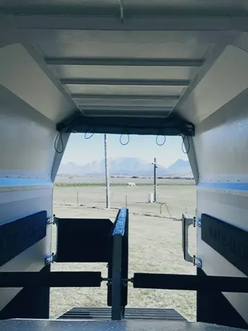 Maximus 2 Berth Horsebox: Inside, from the ramp: padded centre partition and sides, rubber floor
