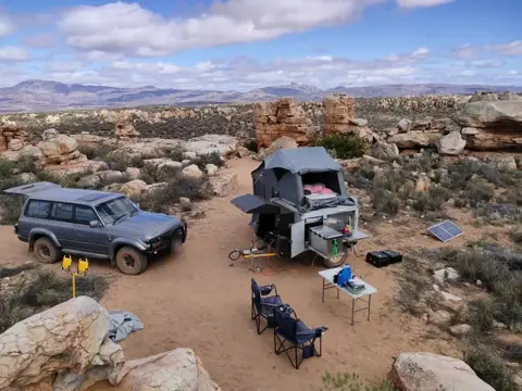 XK6: Rooftop tent up and the kitchen out